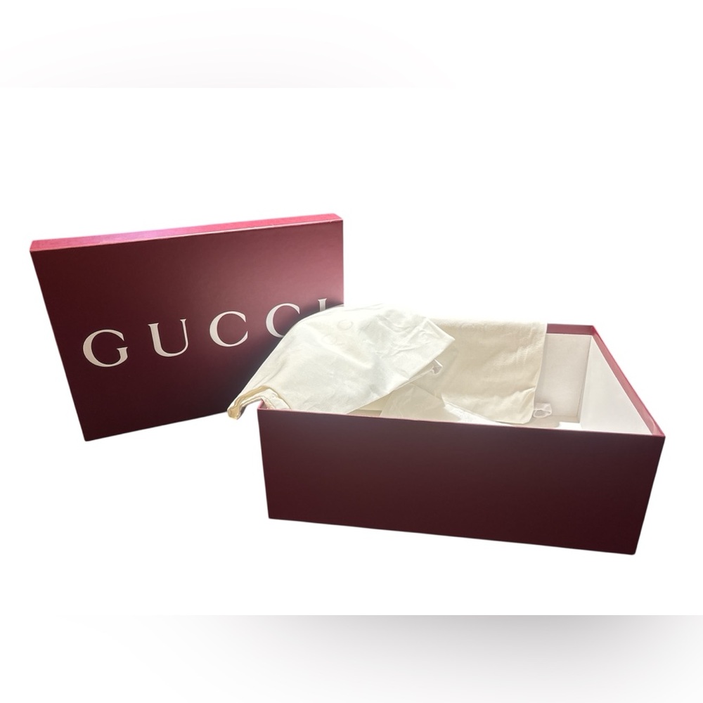 Red Gucci box with a dust bag.